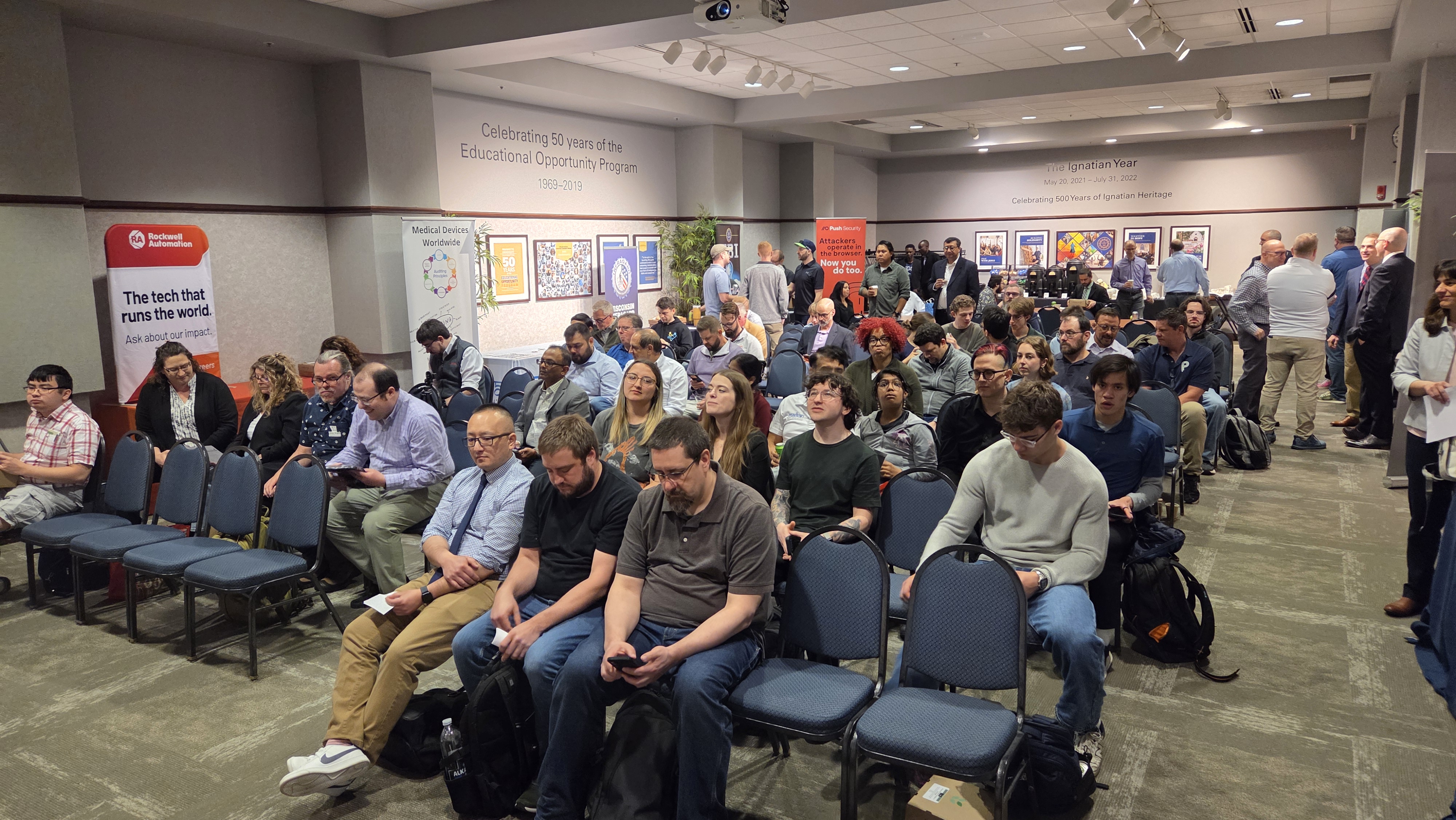 Audience filling the main hall before the keynote